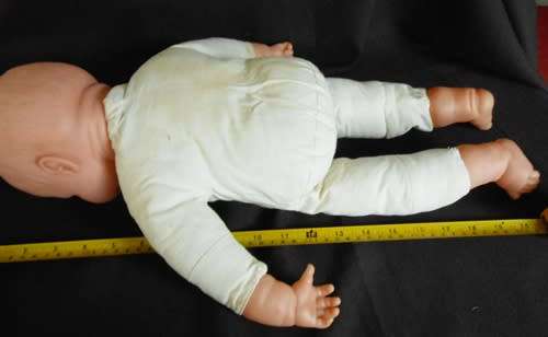 big soft bodied baby doll with brown eyes