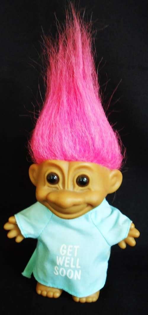 collectable troll doll by Russ Berrie in hospital gown with get well wishes