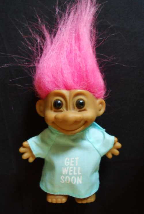 collectable troll doll by Russ Berrie in hospital gown with get well wishes