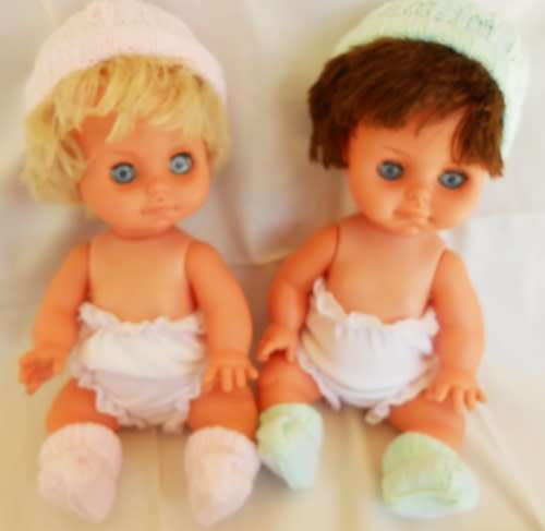Two vintage Hard plastic and vinyl dolls playmates made in hong kong price reduced