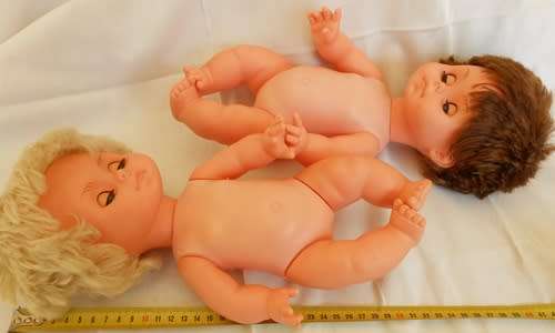 Two vintage Hard plastic and vinyl dolls playmates made in hong kong price reduced
