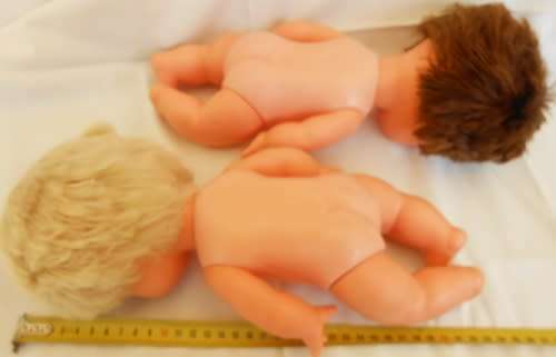 Two vintage Hard plastic and vinyl dolls playmates made in hong kong price reduced