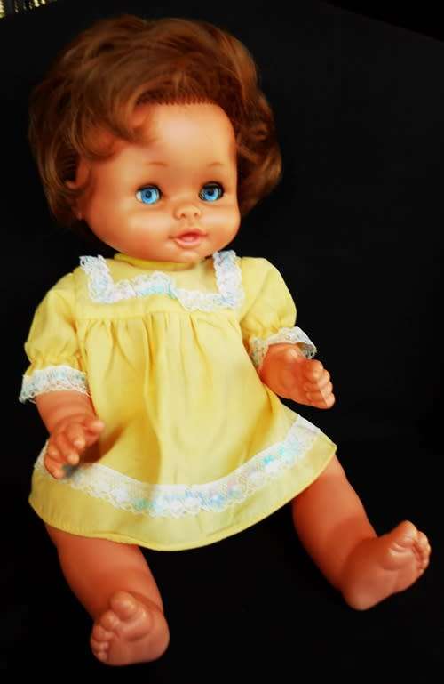 Vintage Famosa 13" Baby Girl Doll brunette Blue Eyes Yellow Outfit made in Spain