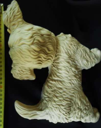 vintage 1960 s rubber puppy toy by Edward Mobley with sleep eyes.