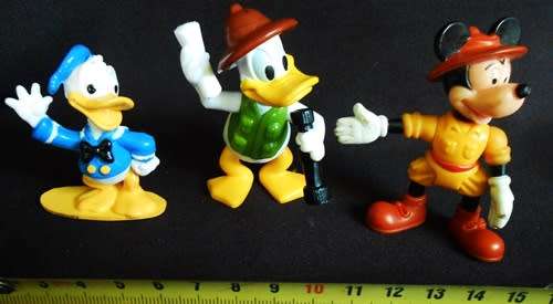 collectible disney figures mickey mouse donald duck and uncle scrooge