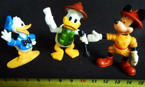 collectible disney figures mickey mouse donald duck and uncle scrooge