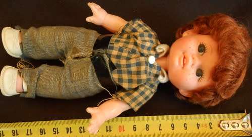 Vintage hard plastic and vinyl boy doll in original clothes made in Hong Kong