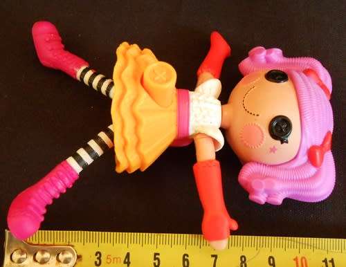 collectable small La La Loopsy doll with sound and action button