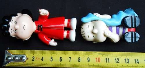collectable peanuts figurines Lucy and Linus made for Colgate Palmolive