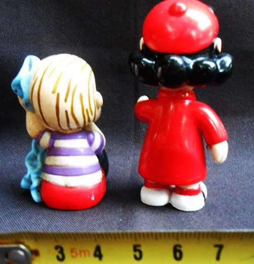 collectable peanuts figurines Lucy and Linus made for Colgate Palmolive