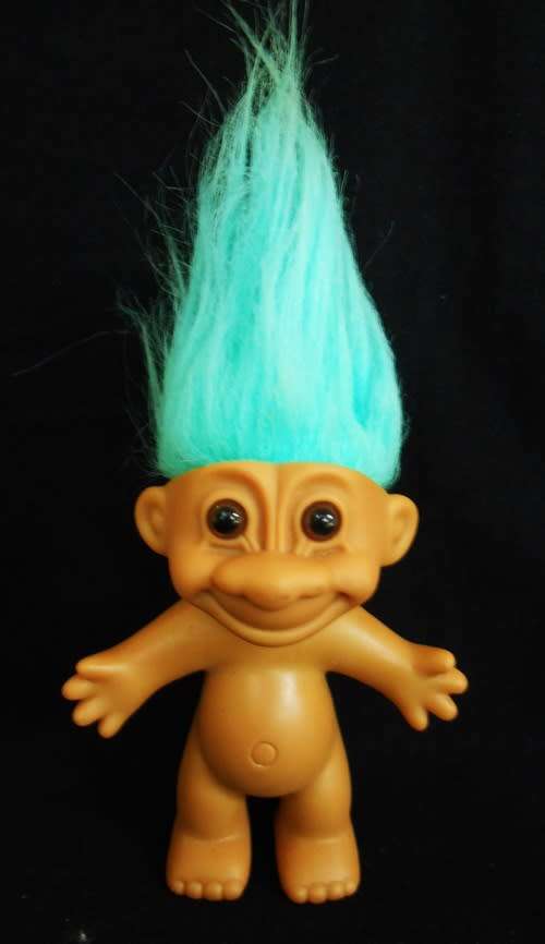 collectable vintage troll doll with turquoise hair