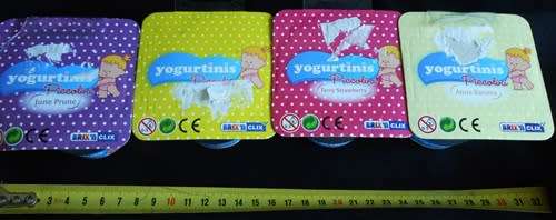 Collectable four Yogurtinis dolls clad in diapers New in Packet