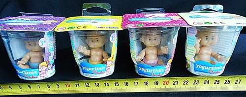 Collectable four Yogurtinis dolls clad in diapers New in Packet