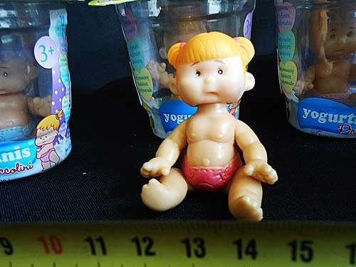 Collectable four Yogurtinis dolls clad in diapers New in Packet