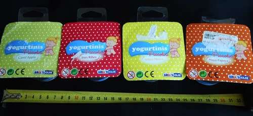 Collectable four Yogurtinis dolls clad in diapers New in Packet