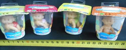 Collectable four Yogurtinis dolls clad in diapers New in Packet