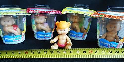 Collectable four Yogurtinis dolls clad in diapers New in Packet