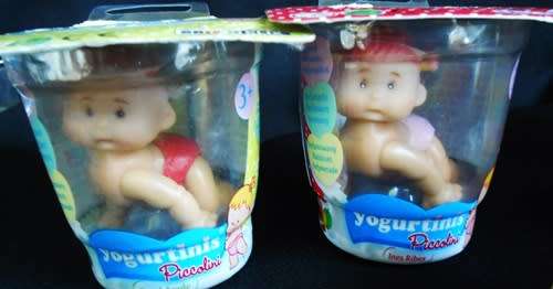 Collectable four Yogurtinis dolls clad in diapers New in Packet