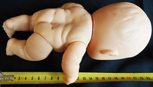 Collectable Berenguer chubby baby doll in original clothes 23 cm high