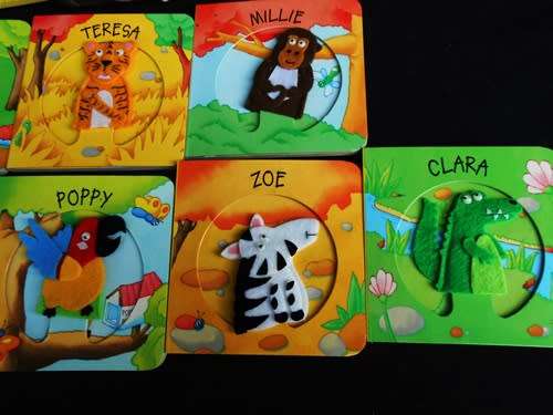 set of nine baby books with animal finger puppets