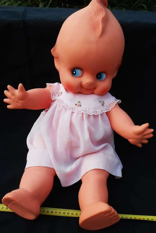 Collectable large Vintage Kewpie Doll in pink dress