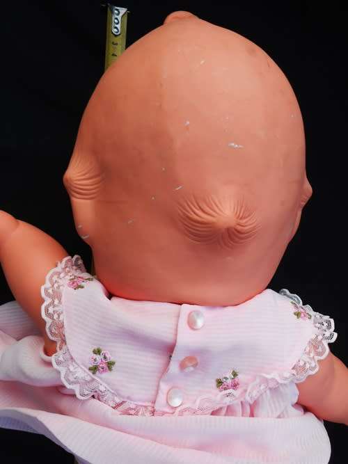 Collectable large Vintage Kewpie Doll in pink dress