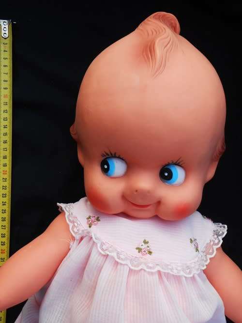 Collectable large Vintage Kewpie Doll in pink dress