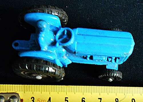 Collectable Small Tomte Laerdal Ford tractor in blue 1:64