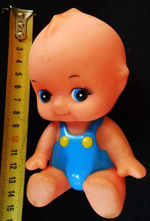 collectable small Kewpie doll 15 cm sitting down