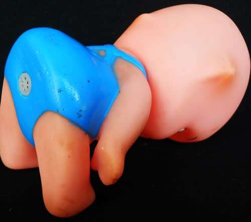 collectable small Kewpie doll 15 cm sitting down