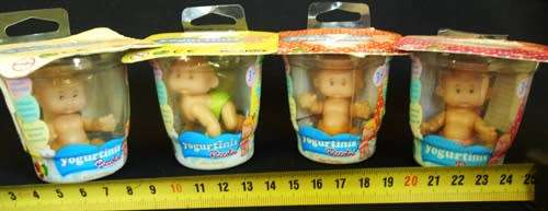 Collectable small dolls Yogurtinis Piccolini with diaper in yogurt tub 4 dolls set 1
