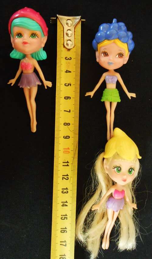 tiny fairy type dolls with fruit headresses 3 dolls