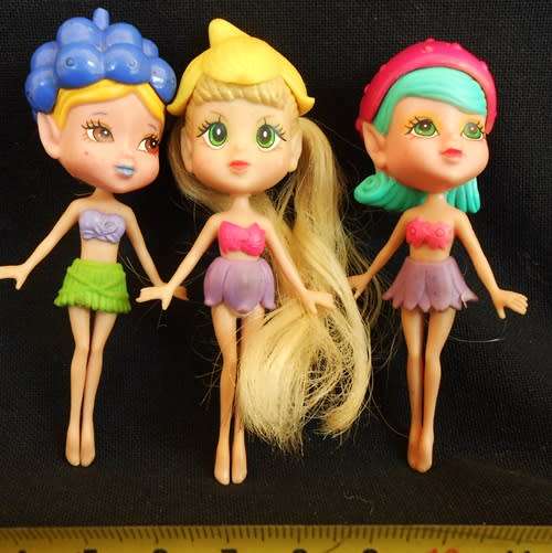 tiny fairy type dolls with fruit headresses 3 dolls