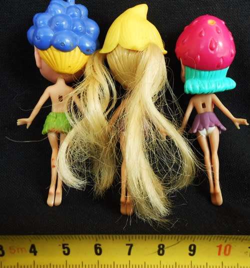 tiny fairy type dolls with fruit headresses 3 dolls