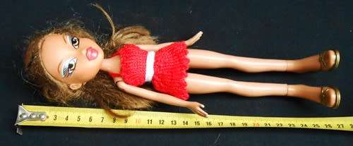 Bratz Girlz doll Yasmin with light brown hair brown eyes tanned look, red dress