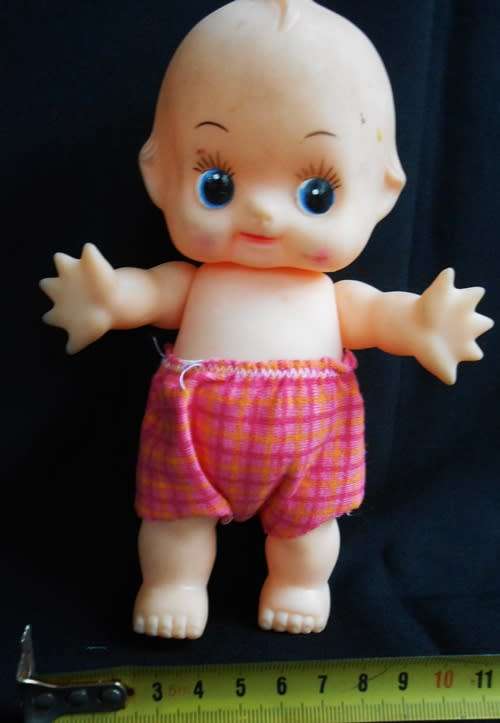Collectable small Kewpie doll in pants
