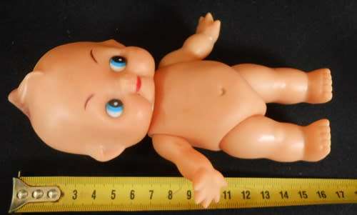 Vintage small kewpie doll  in white pants