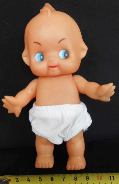 Vintage small kewpie doll  in white pants