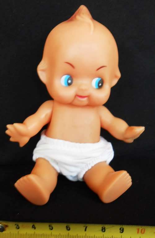 Vintage small kewpie doll  in white pants