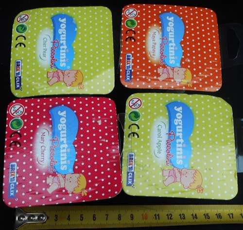 collectable Yogurtini Babies Set of four different small babies in diapers N I P set 1