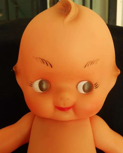 Vintage Kewpie doll with brown eyes 30 cm