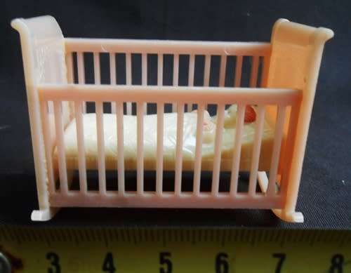 Collectable vintage hard plastic tiny toy cradle 1940-50 s by Reliable Plastic Company Canada