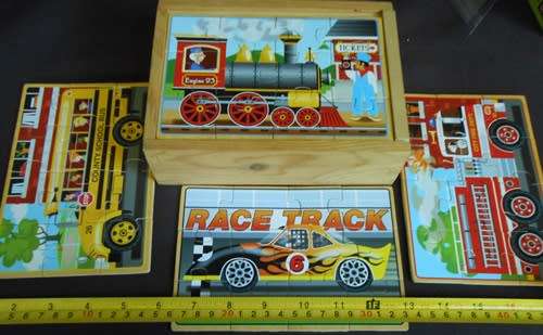 Set of four wooden jigsaw puzzles 12 pieces each in a handy storage box like new