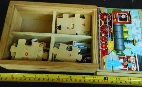 Set of four wooden jigsaw puzzles 12 pieces each in a handy storage box like new