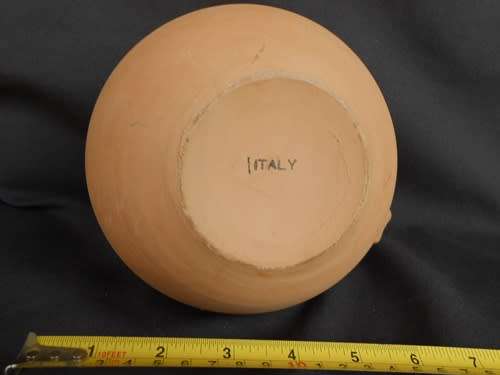 Beautiful classic shape terracotta jug with white glaze inside from Italy