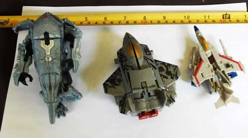 collectable three small Transformer space craft robots