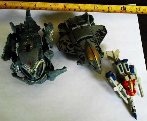 collectable three small Transformer space craft robots