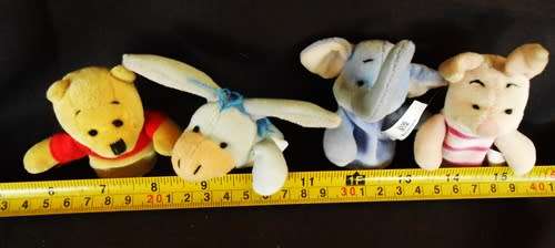 collectable Winnie the Pooh four mini plush finger puppets Disney made for Woolworths