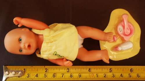 collectable mini baby doll by Simba with Zapf mini Baby Born accessories