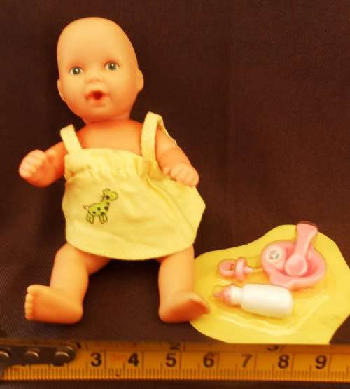 collectable mini baby doll by Simba with Zapf mini Baby Born accessories